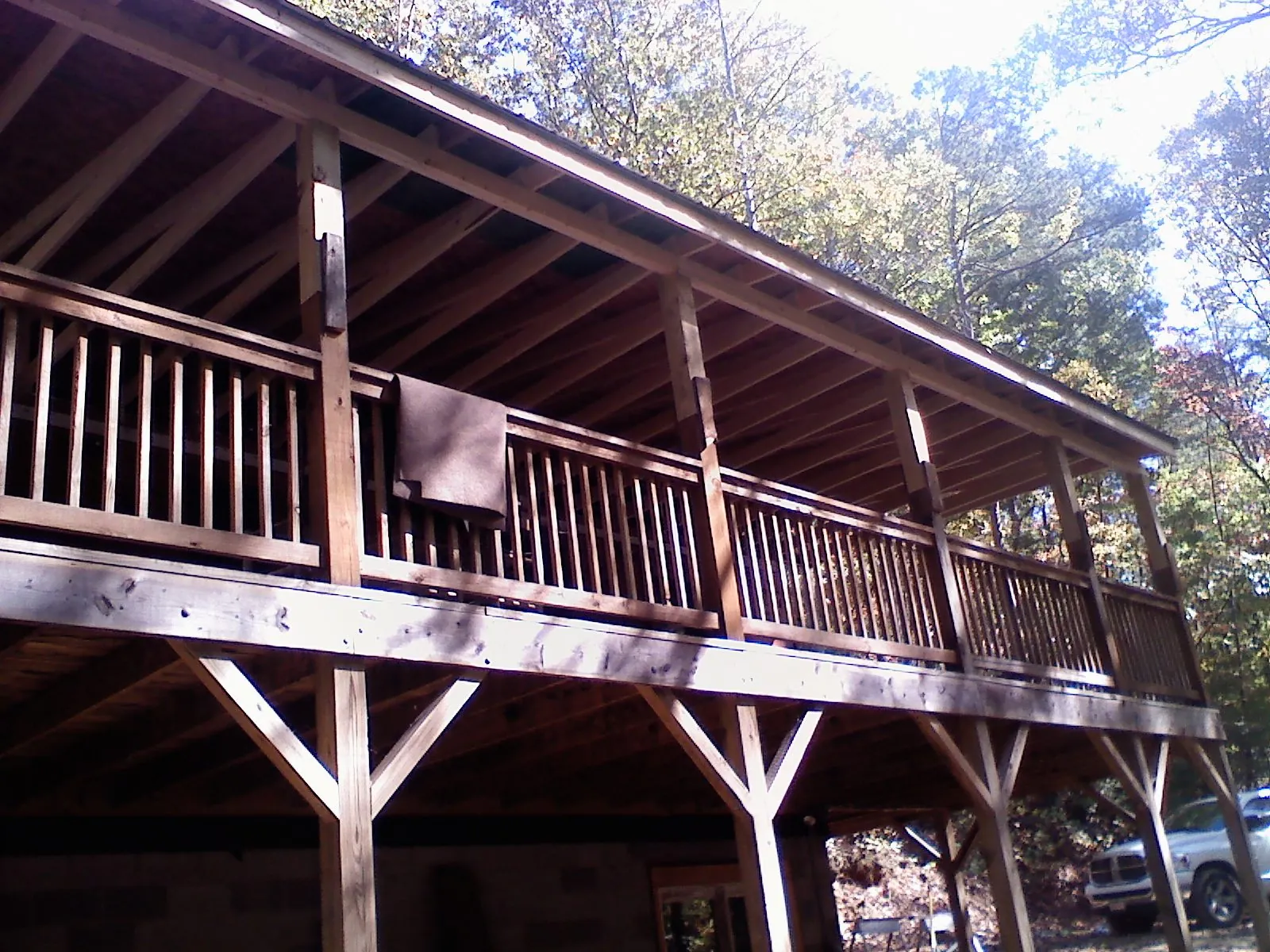 Timber framing under a new elevated porch and deck — Roof Leak Repair in Laketown by Roofing Brothers